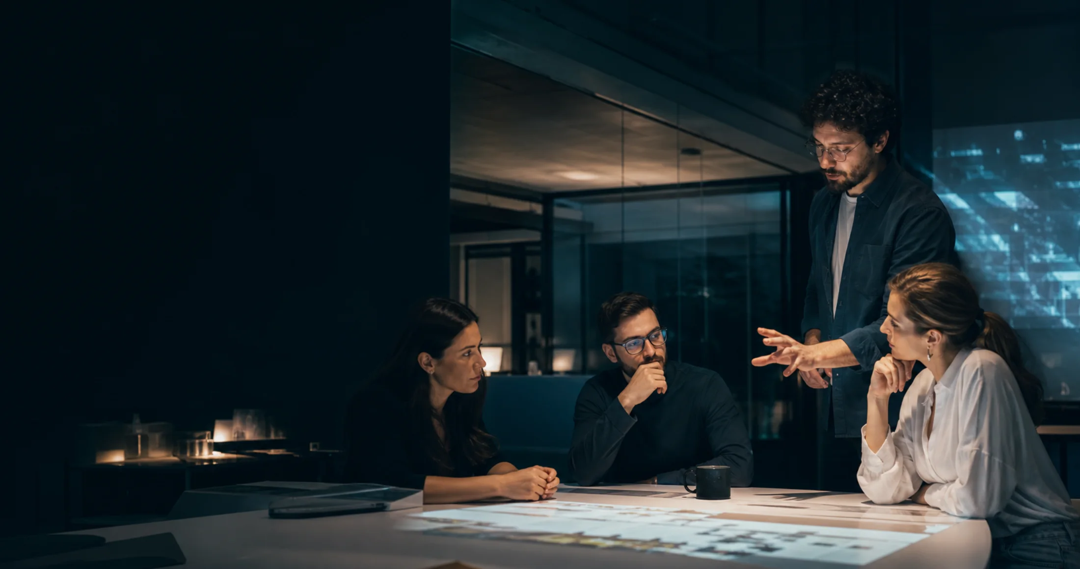 People collaborating on an AI transformation project